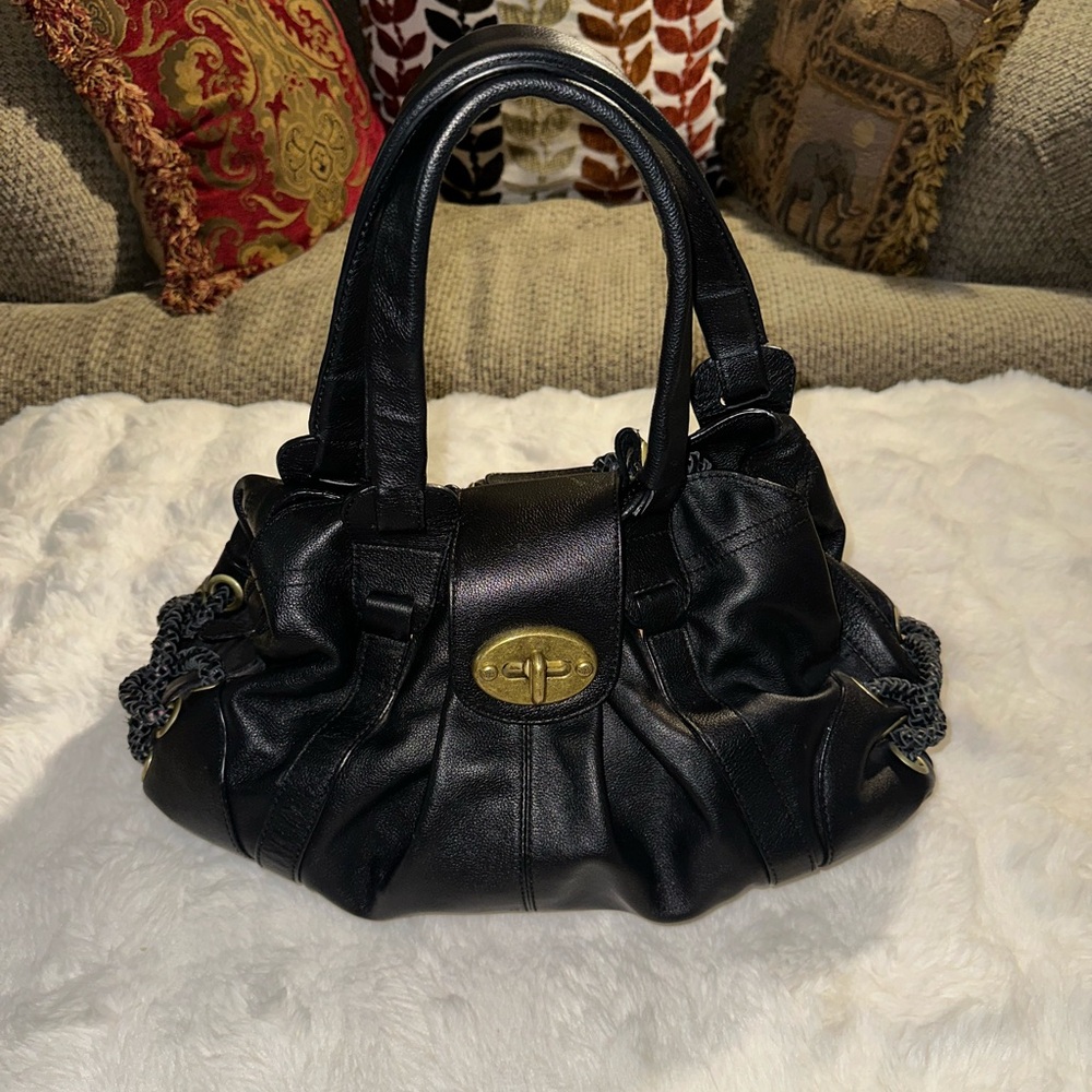 Authentic Mulberry leather purse with gold hardware.